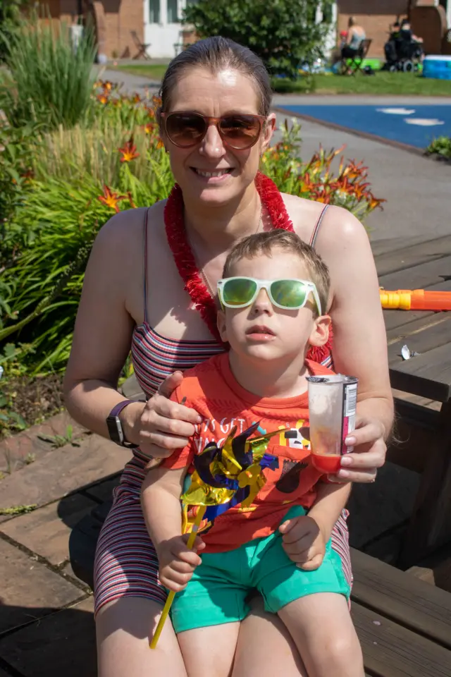 Mother and son in shades