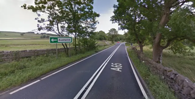 A65 and Austwick sign