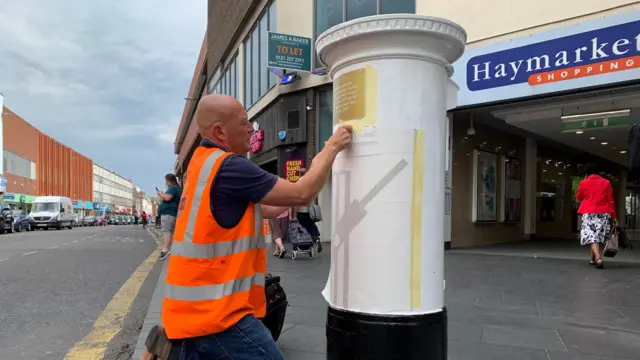 White postbox in Leicester