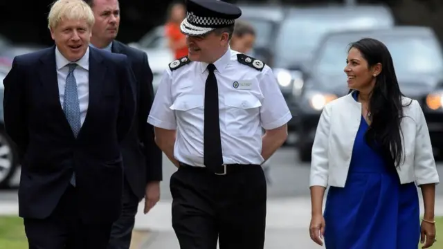 Britain"s Prime Minister Boris Johnson and Home Secretary Priti Patel meet with Chief Constable of West Midlands Police Dave Thompson