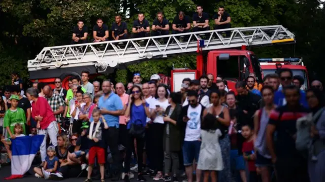 Fans adorn the street at the Tour de France