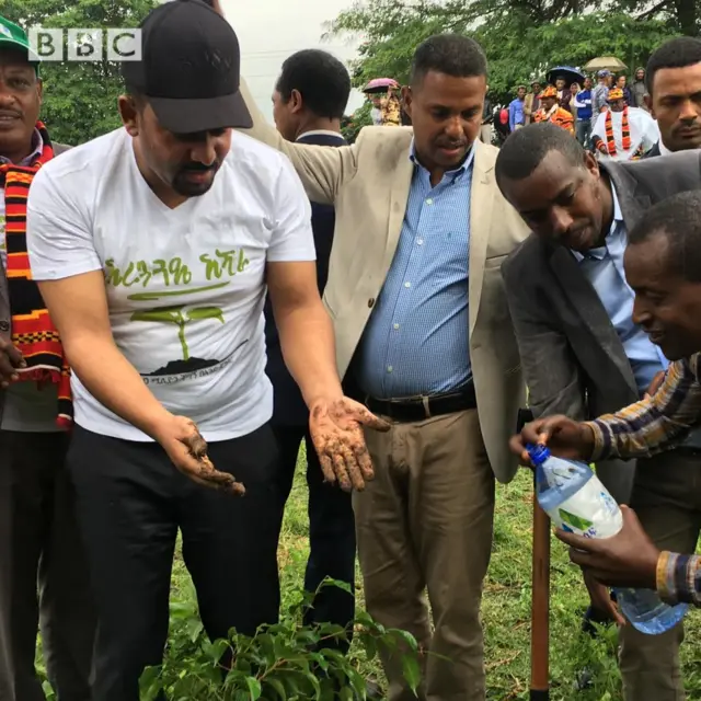 PM Abiy Ahmed washing his hands