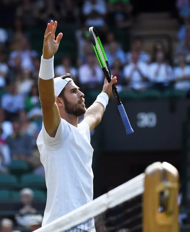 Karen Khachanov celebrates victory