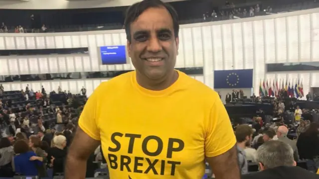 Shaffaq Mohammed wearing the yellow t shirt