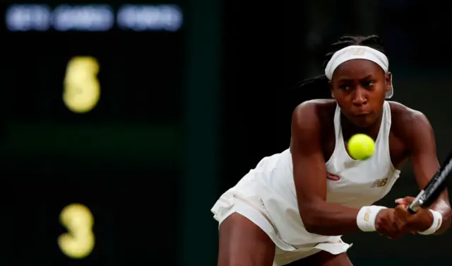 Coco Gauff hits a backhand