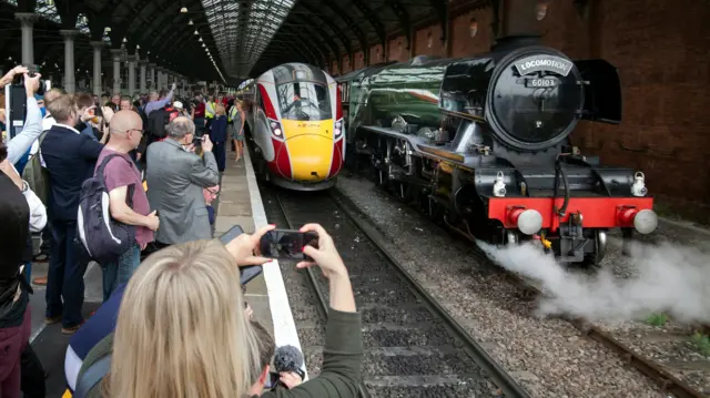 A new Azuma train alongside the Flying Scotsman locomotive at Darlington Train Station