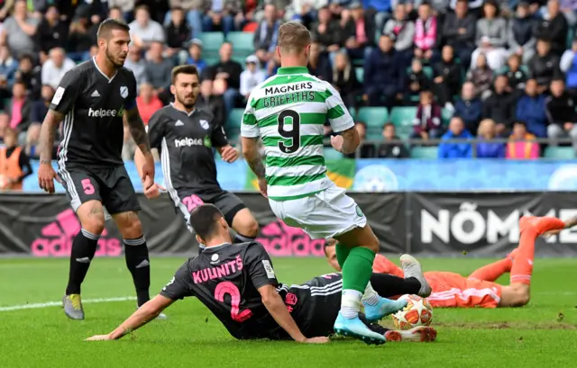 Leigh Griffiths looks on as Aleksandr Kulinits knocks in an early own goal