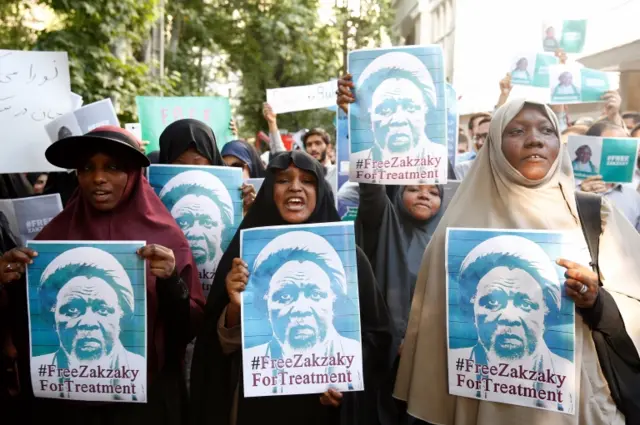 Protesters hold placard and shout slogans demand to release the Nigerian Ibrahim Zakzaky, next to the Nigeria embassy in Tehran, Iran, 17 July 2019