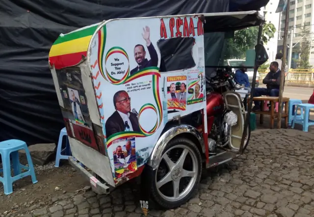 Posters of Ethiopian Prime Minister Abiy Ahmed are seen on a tuc-tuc in Addis Ababa, Ethiopia on November 07, 2018.