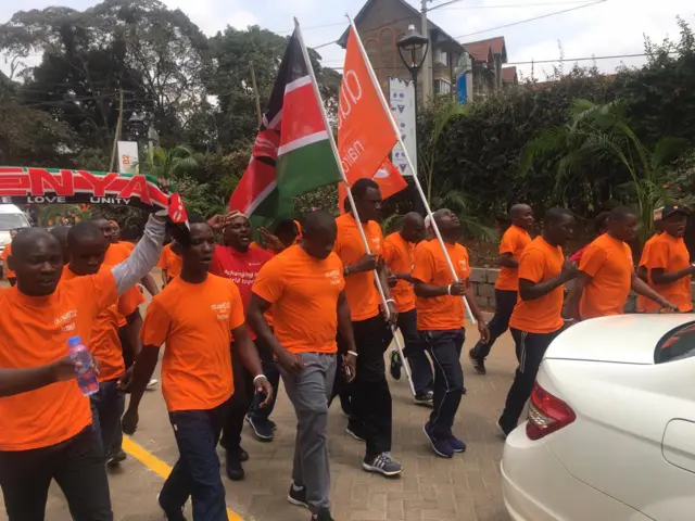 People with flag at Dusit hotel in Nairobi