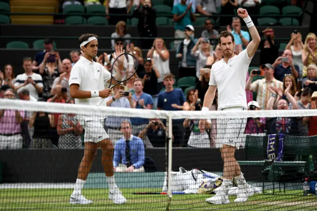 Andy Murray and Pierre-Hugues Herbert celebrate on court