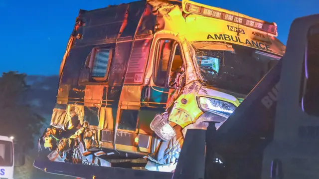 Ambulance being removed after crash