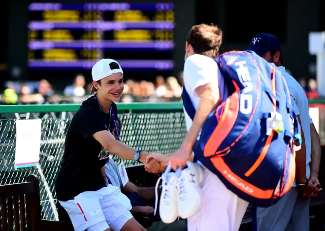 Romeo Beckham meets Andy Murray