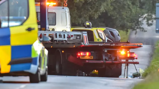 Ambulance on side after crash