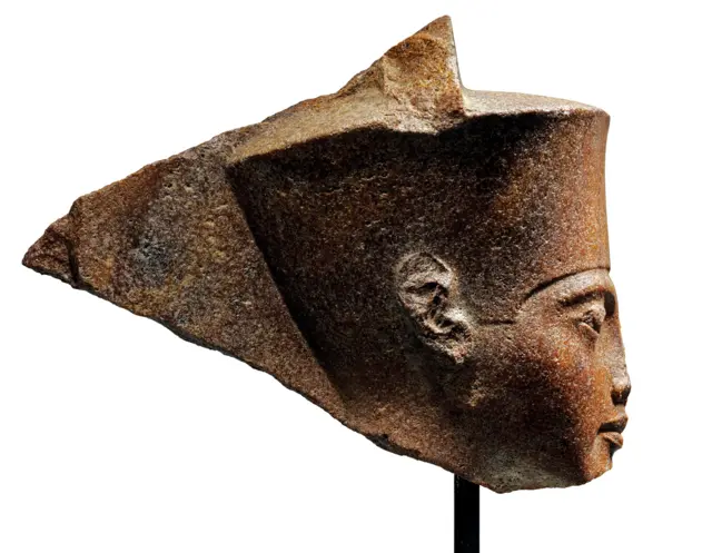 An undated handout picture released by the auction house Christie's in London on 26 June 2019, shows a 3,000-year-old stone bust of Tutankhamun, set to be auctioned on July 4.