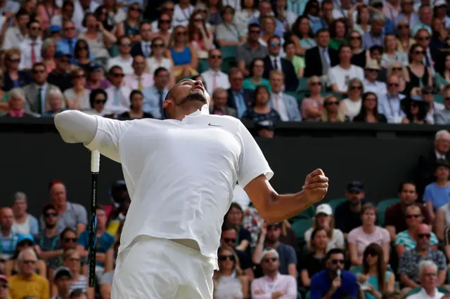 Nick Kyrgios serves