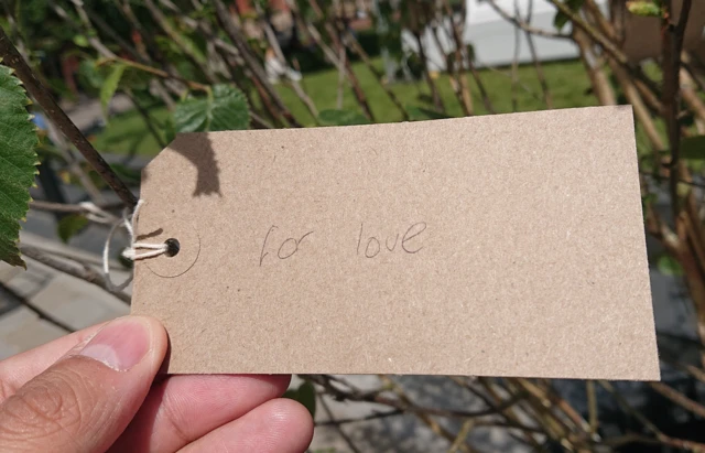 A note with 'For Love' written on it