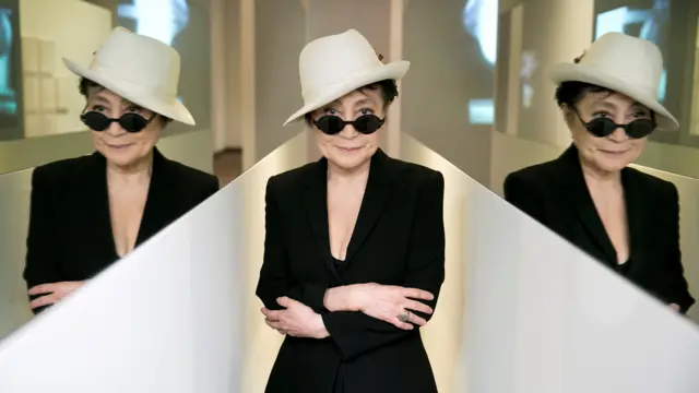 Yoko Ono reflected in two mirrors