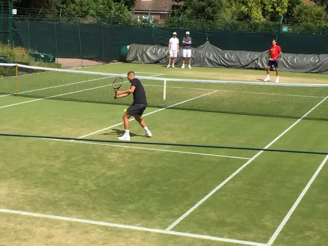 Dan Evans and Roger Federer