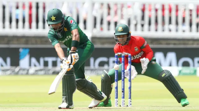 Babar Azam of Pakistan turns the ball off his leg