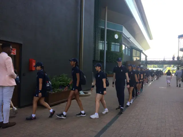 Ball boys and girls arrive at Wimbledon