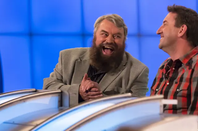 Actor Brian Blessed shares a laugh with comedian Lee Mack