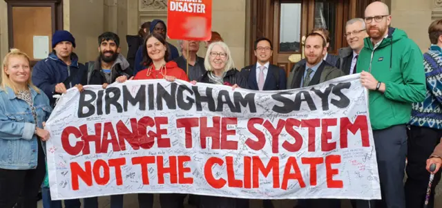 'Change the system not the climate'