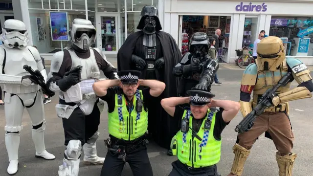 Police with Darth Vader