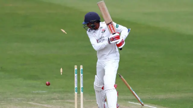 Haseeb Hameed of Lancashire is bowled by Ben Sanderson