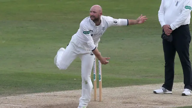 Adam Lyth bowls for Yorkshire