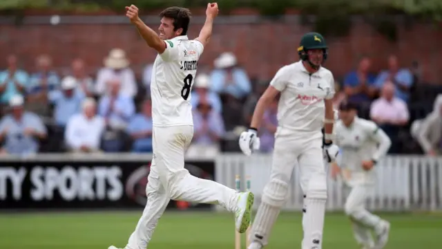 Jamie Overton celebrates dismissing Jake Ball to complete victory