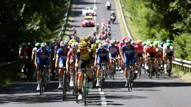 The peloton on stage four