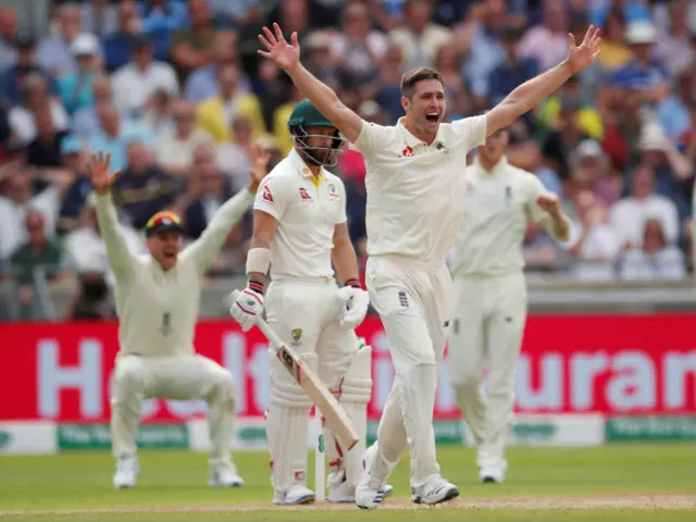 Chris Woakes appeals for the wicket of Australia"s Matthew Wade who is given out following a review