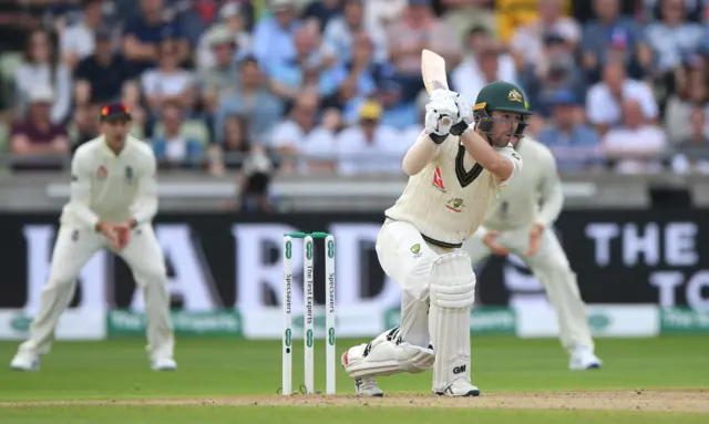 Australia batsman Travis Head drives during day one