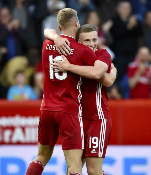 Lewis Ferguson congratulates two-goal hero Sam Cosgrove