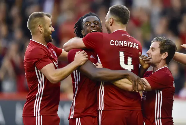 Aberdeen’s Greg Leigh celebrates his debut goal for the Dons