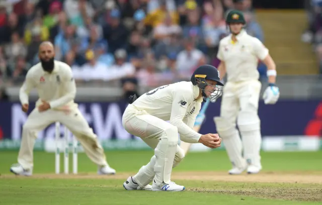 Jos Buttler takes a catch off Moeen Ali to dismiss Peter Siddle during day one of the First Specsavers Ashes Test Match between England and Australia