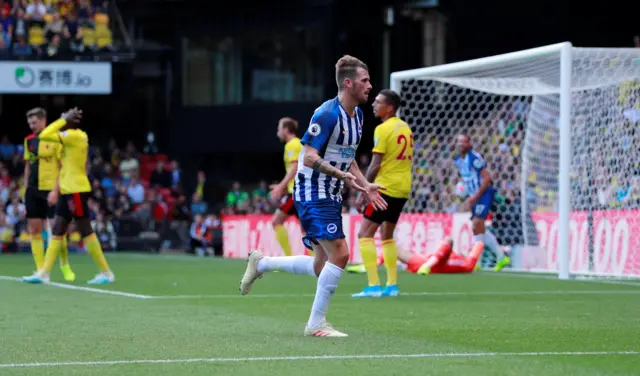 Pascal Gross celebrates after Brighton take the lead