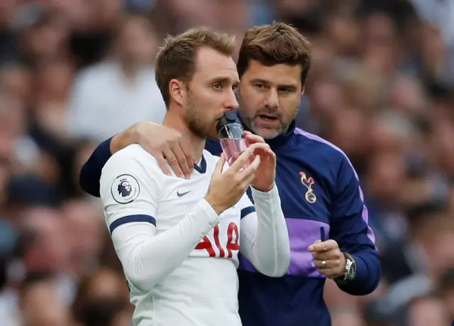 Christian Eriksen and manager Mauricio Pochettino