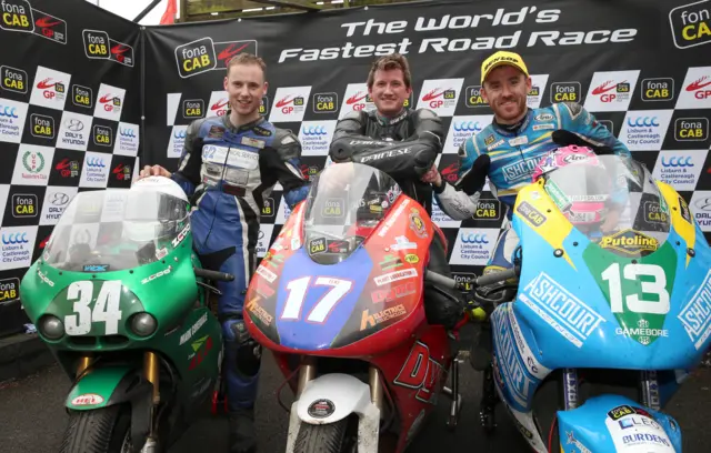 Joe Loughlin (second), Christian Elkin (winner) and Lee Johnston (third) after the Supertwins race