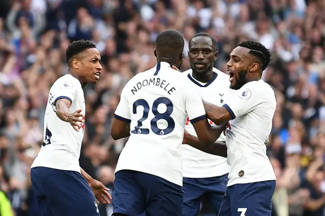 Tanguy Ndombele celebrates with his Spurs team-mates