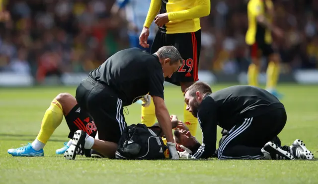 Andre Gray receives treatment