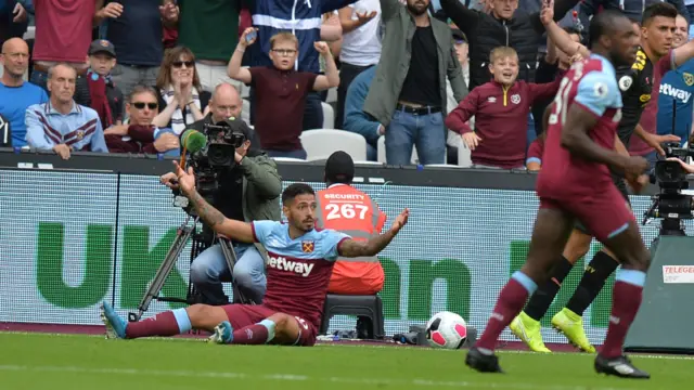 Manuel Lanzini appeals for a penalty