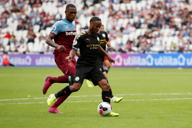 Raheem Sterling rolls in his third goal