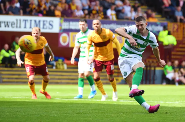 Ryuan Christie sweeps in a penalty for Celtic