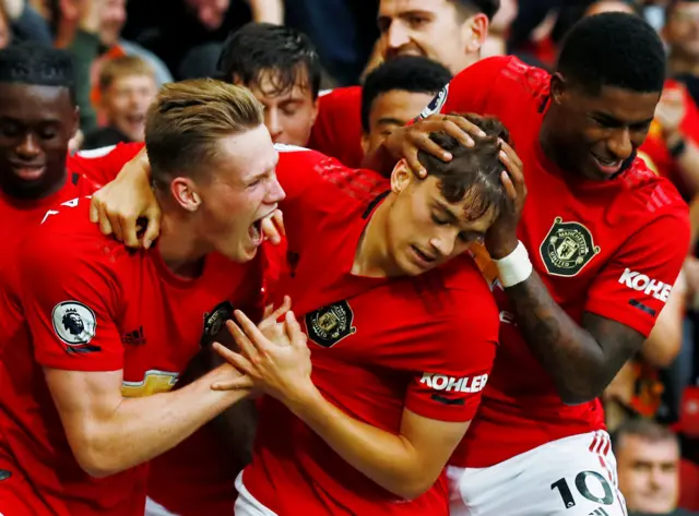 Daniel James celebrates with his Manchester United team-mates