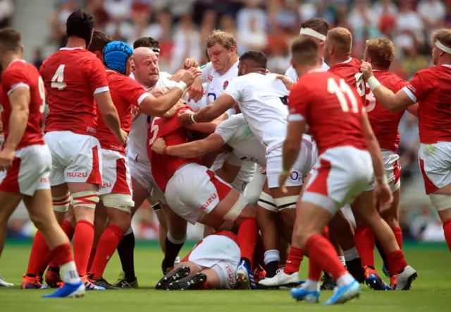 England and Wales players in a scuffle