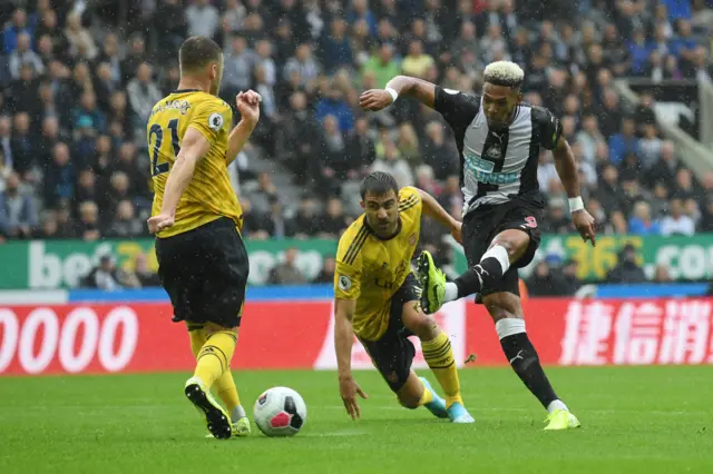 Joelinton of Newcastle United shoots