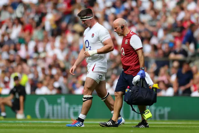 Tom Curry walks off the pitch