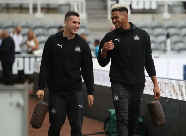 Javier Manquillo (left) and Joelinton arrive at St. James' Park